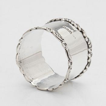A sterling silver egg cup and napkin ring in original fitted case, Chester 1909.