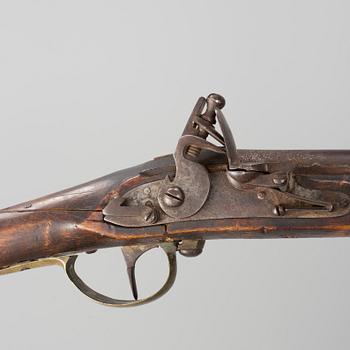 An early 19th century flintlock rifle.