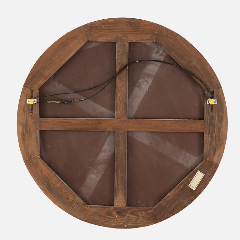 A round mirror. 1930's.