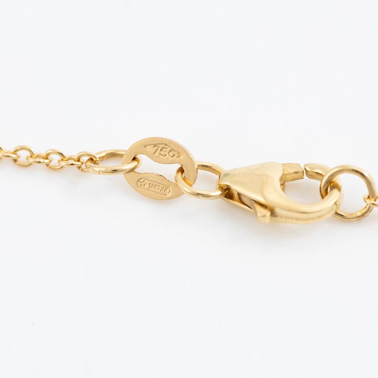 Necklace 18K gold with purple tourmaline and brilliant-cut diamond.