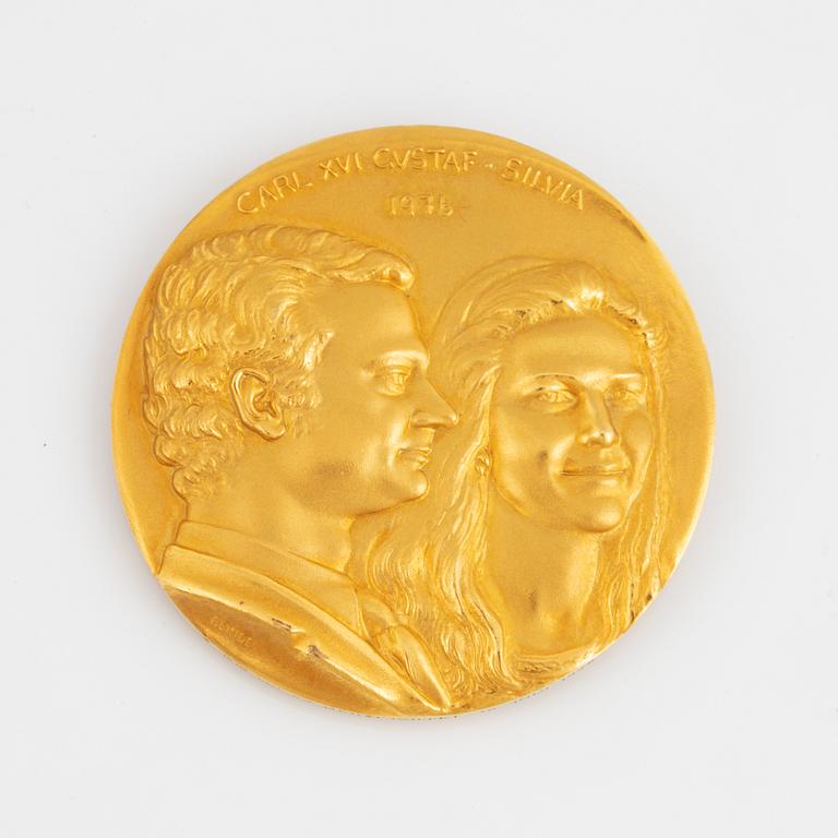 A Swedish commemorative medal in 18K gold.