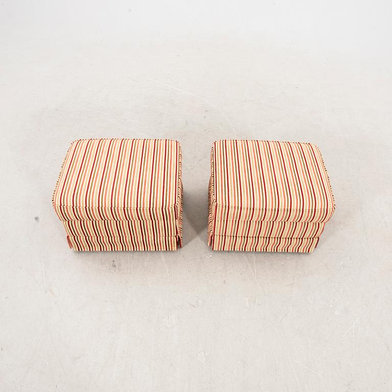 A pair of easy chairs with footstools by Bröderna Andersson 21st century.