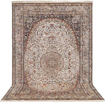 A silk Kashmir carpet, approx. 300 x 200 cm.