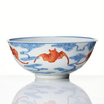 A Chinese iron-red-decorated blue and white Wufu bat bowl, late Qing dynasty, around 1900.