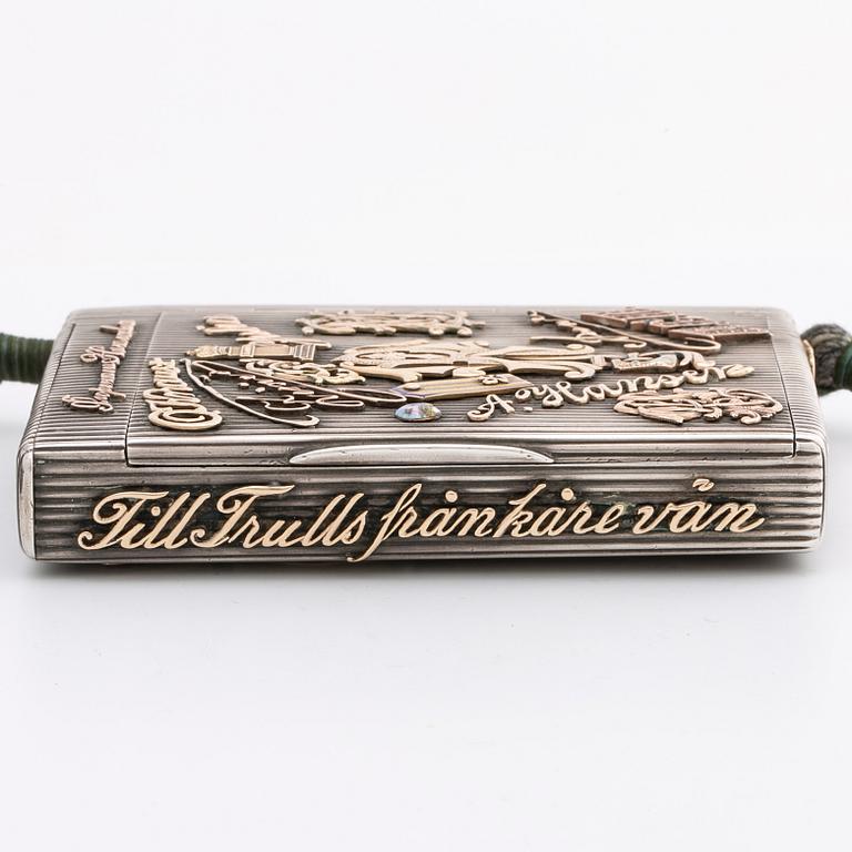 Silver box, gold, enamel, rose-cut diamonds, saphires and rubies (possibly synthetic), silk chord, St Petersburg.