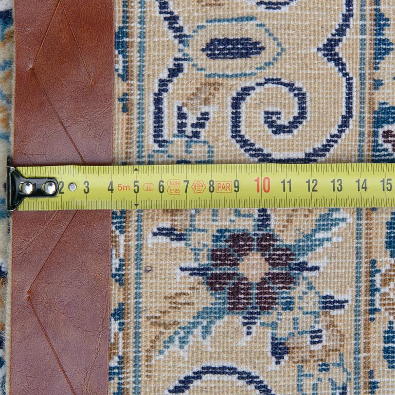 A carpet, Nain, part silk, 9 LAA, ca  577 x 380 cm.