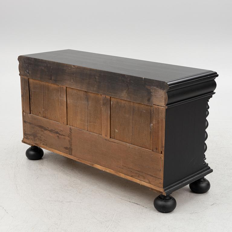 A Baroque style sideboard, first half of the 20th Century.