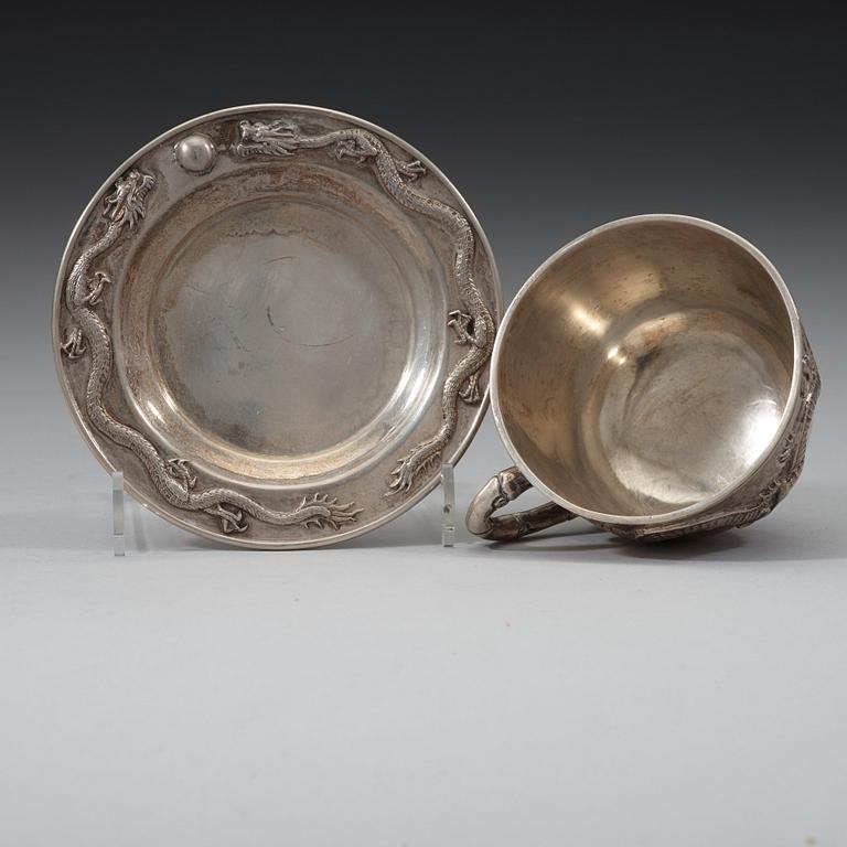 An export silver cup and saucer, probably Shanghai, early 20th century.