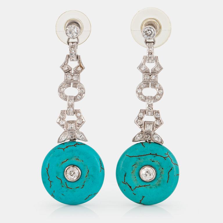 A pair of platinum earrings set with turquoises and old-cut diamonds  with a total weight of ca 1.30 cts.