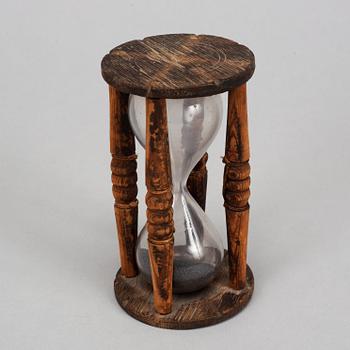 An hourglass, wooden frame, 18th/19th century.