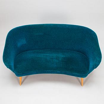 A 1950s sofa and armchair.