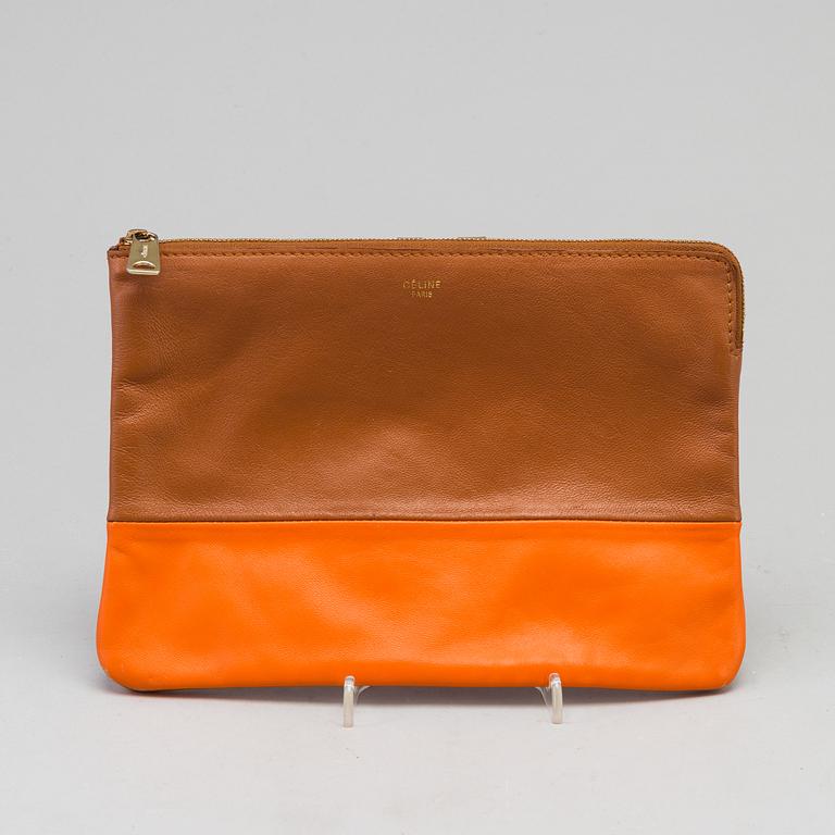 A leather Céline clutch.