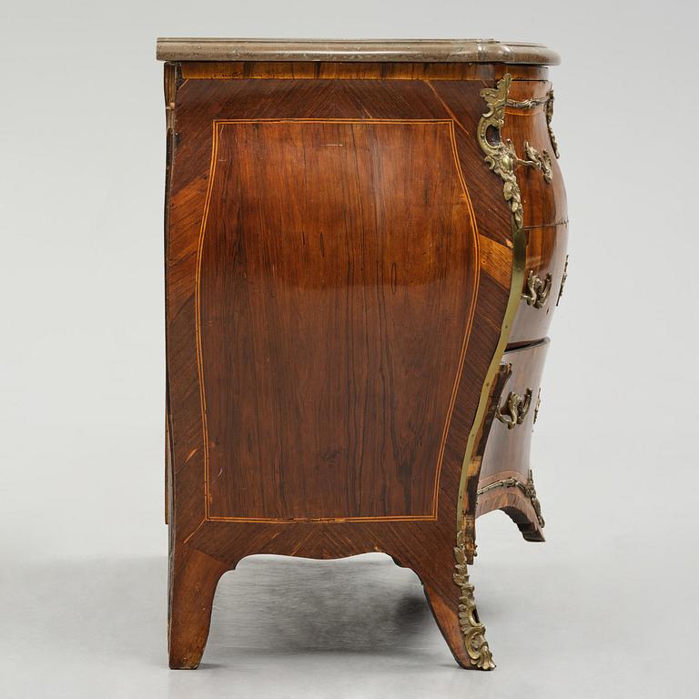 A rococo parquetry commode by C. G. Willkom (master in Stockholm 1763-65).