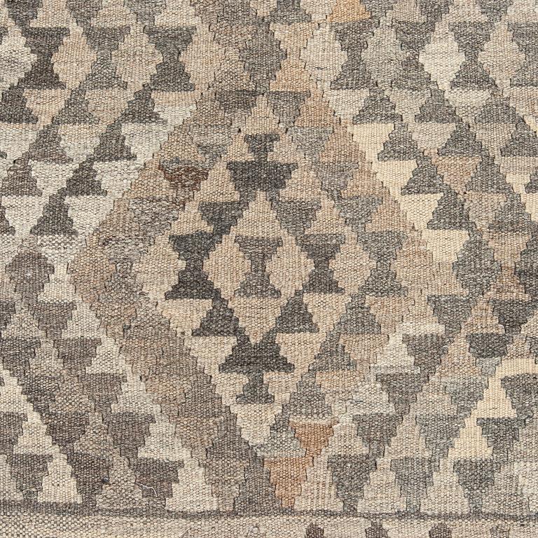 A Kilim carpet, ca. 262 x 176 cm.