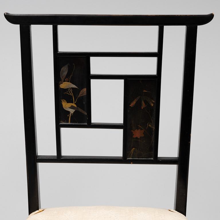 Four chairs with Japanese laquer panels, first half of the 20th Century.