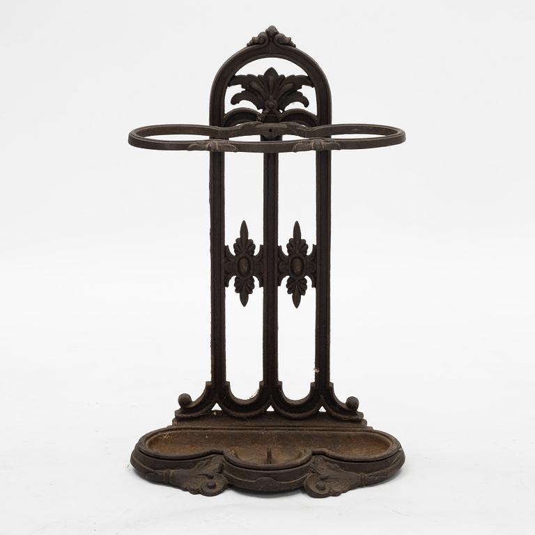 A cast iron umbrella stand, circa 1900.