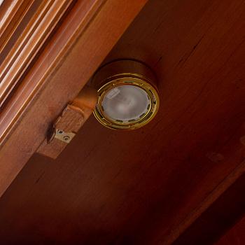 An English yew cabinet, 21st Century.