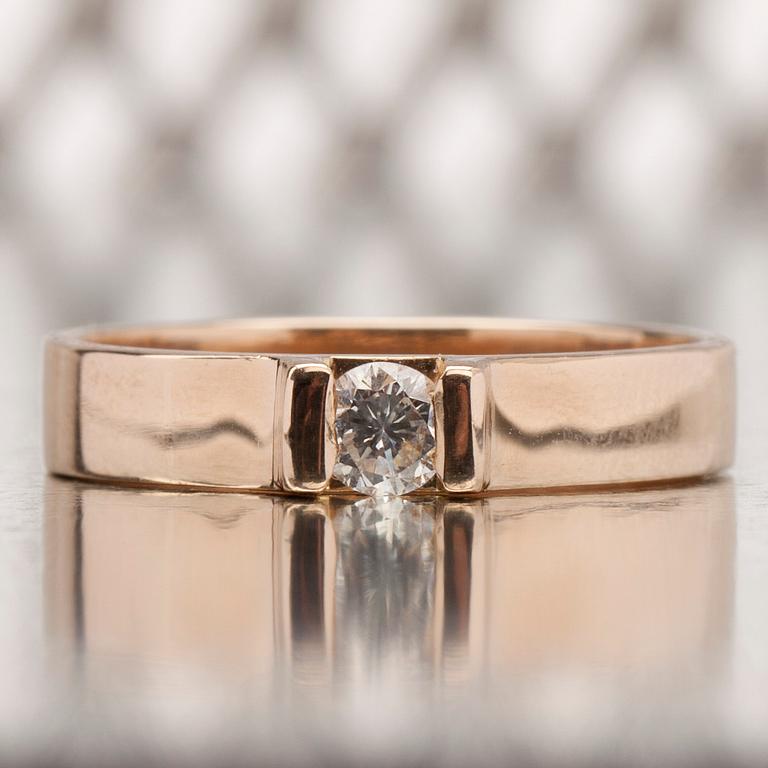 RING, 14K guld, briljantslipad diamant ca 0.25 ct uppskattningsvis W/vs. Henri Sörensen Åbo 1999. Vikt 4,5 g.