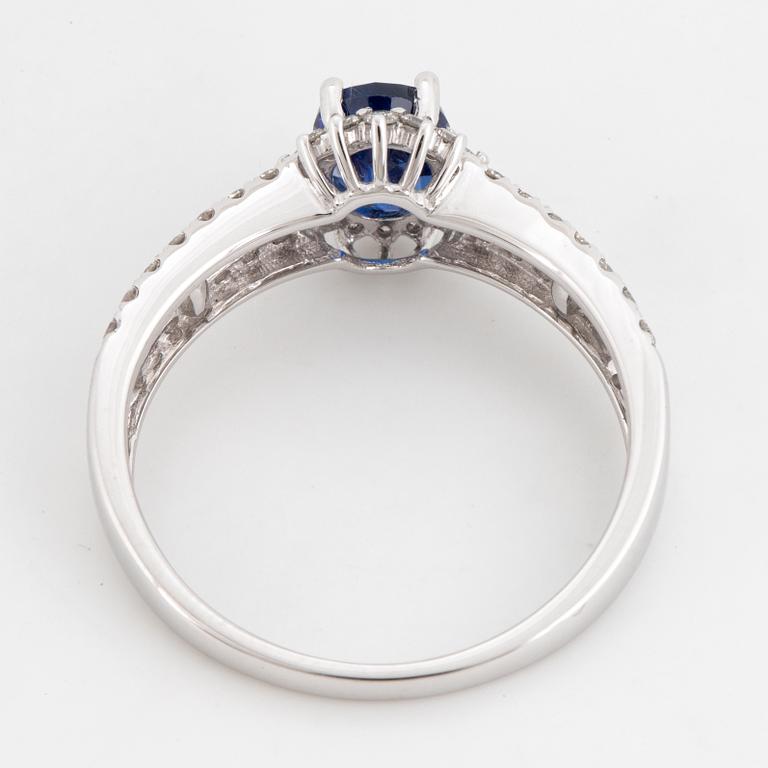 Kyanite and brilliant-cut diamond ring.