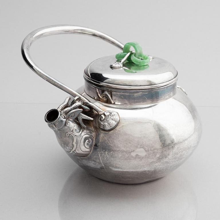 A silver tea pot with cover, Japan, early 20th century.