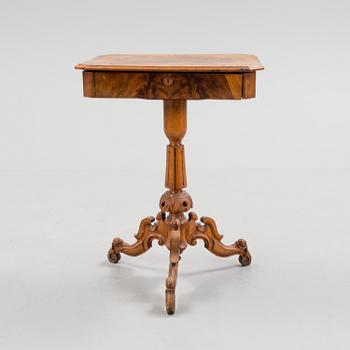 A 19th century sewing table.