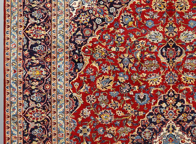 A Keshan carpet, approx. 395 x 300 cm.