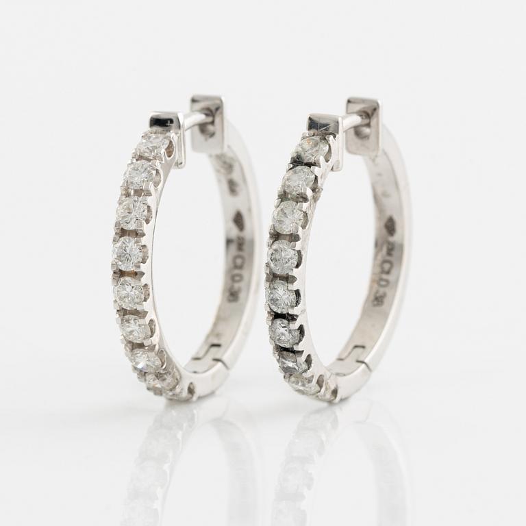 Brilliant cut diamond hoop earrings, total 0,76 ct.