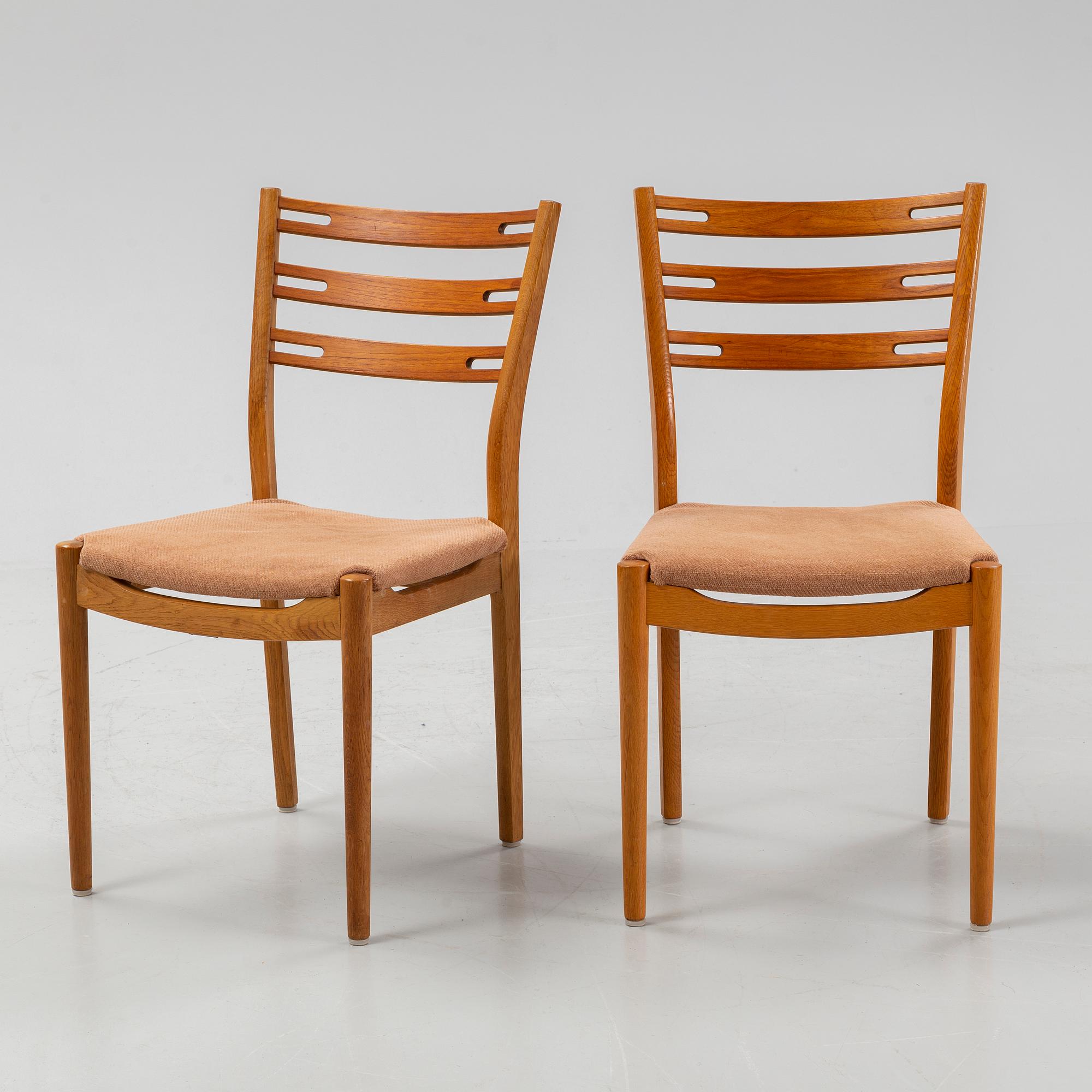 Helge Sibast, A set of four oak and teak chairs, Sibast Furniture, Denmark, mid 20th Century.