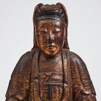 A large wooden gilt lacquer figure of Guanyin, Vietnamese/Southern China, about 1800 or later.