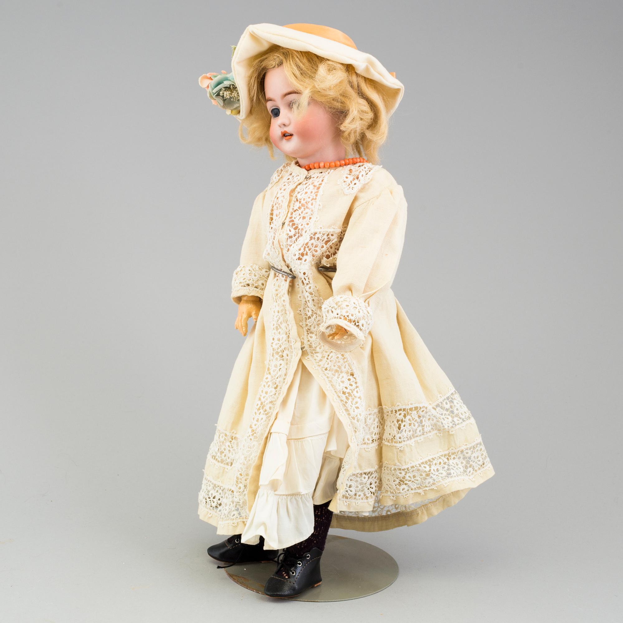 a Franz Schmidt & Co porcellain doll from the early 20th century.