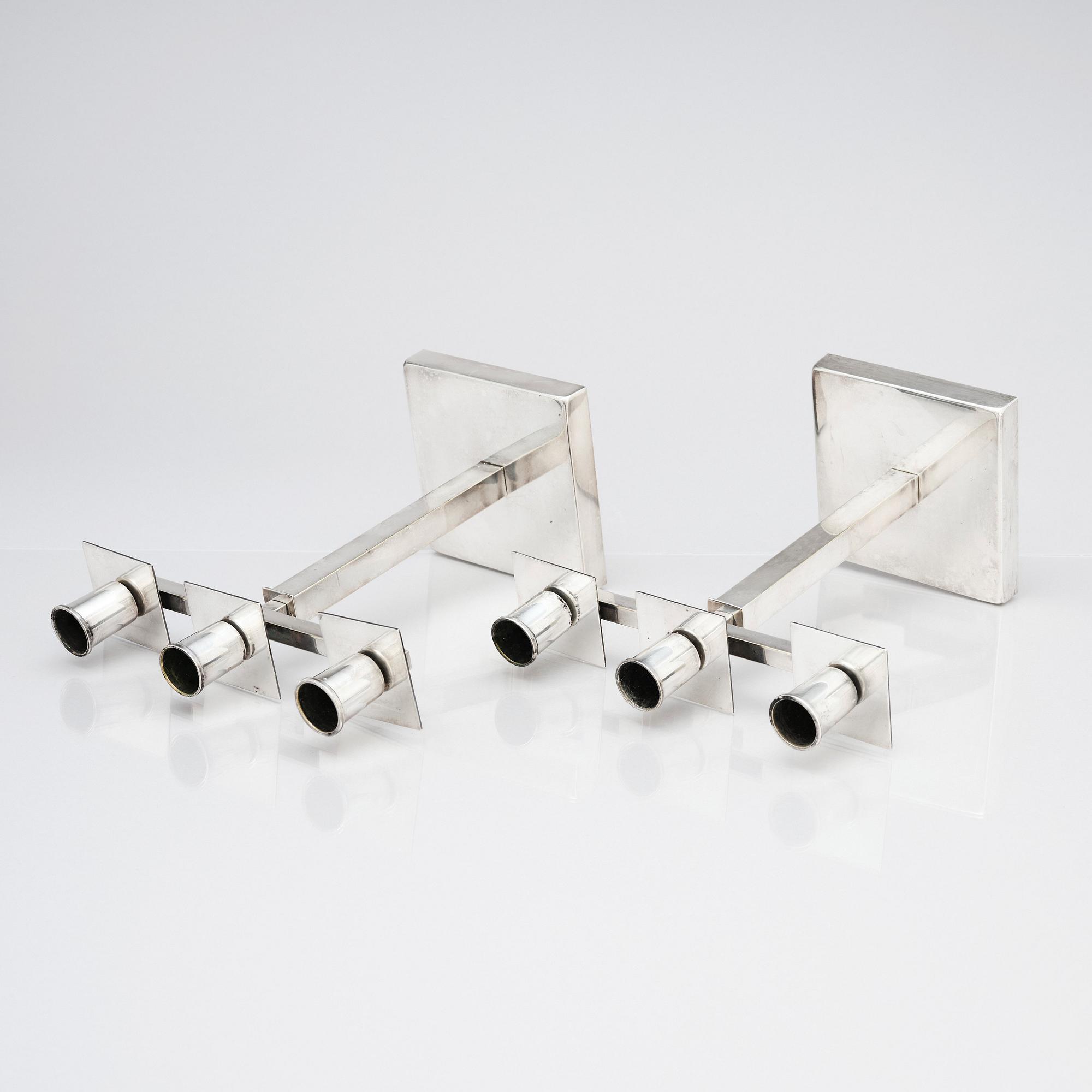 Rolf Engströmer, attributed to, a pair of silver plated candelabra, Fabriksaktiebolaget Kronsilver, Sweden 1930s.