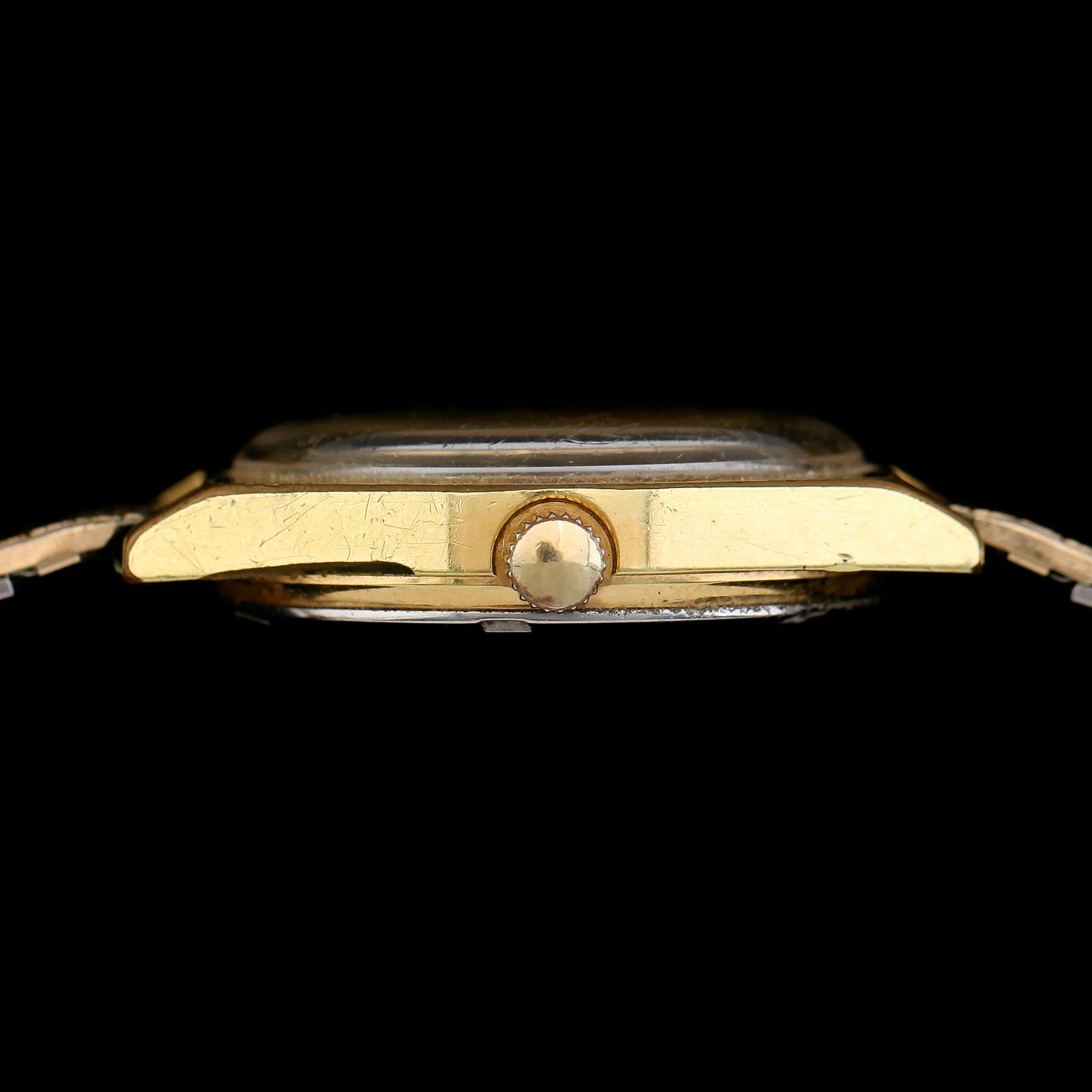 ARMBANDSUR, guld på stål, Omega, Automatic, Genève, 1900-talets andra hälft.