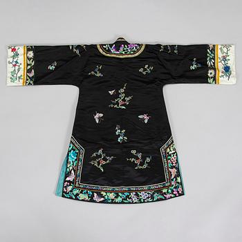 A Chinese embroidered silk robe and a buzi and five other silk embroideries, early 20th century.