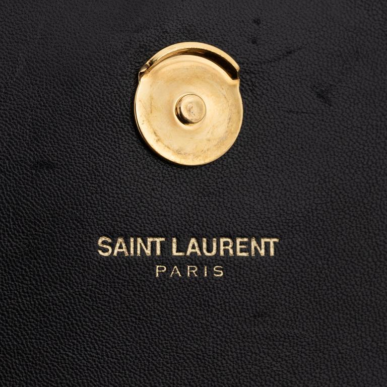 Yves Saint Laurent, a black suede 'Kate Small' handbag.