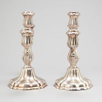 a pair of silver candelabras by K Andersson Gothenburg 1938.