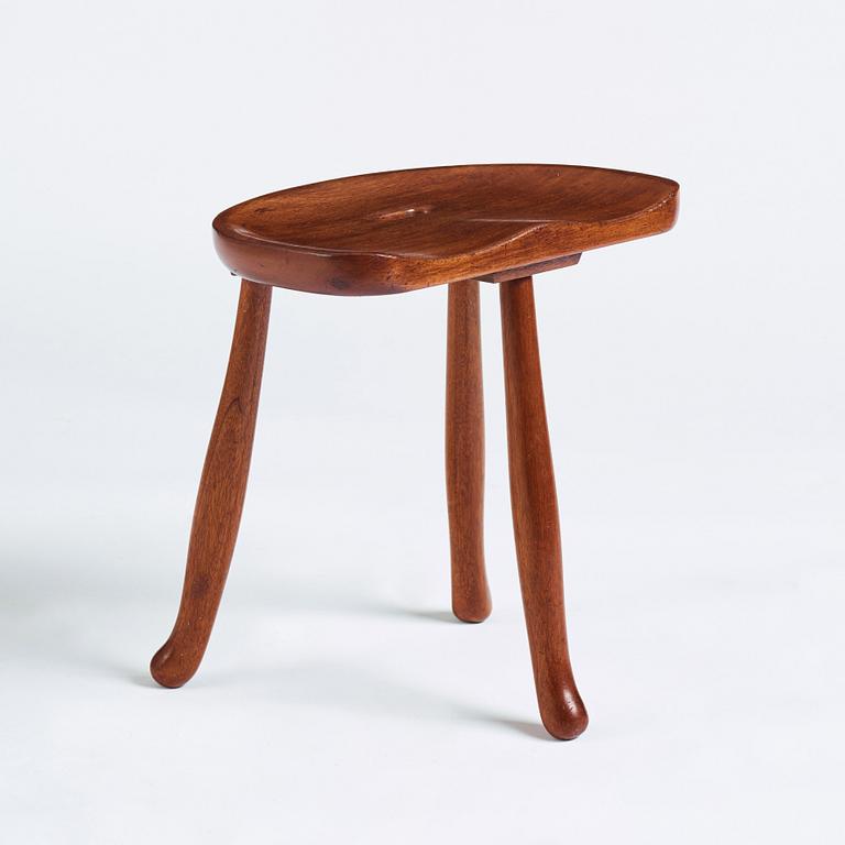 Josef Frank, a three legged mahogany stool, model 336, Svenskt Tenn, Sweden 1940-1950s.