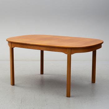 A second half of the 20th century table, two armchairs and six chairs "Ambassadör" by Carl Malmsten.