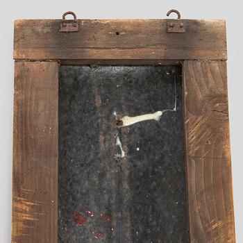 a mid-20th century outdoor thermometer.