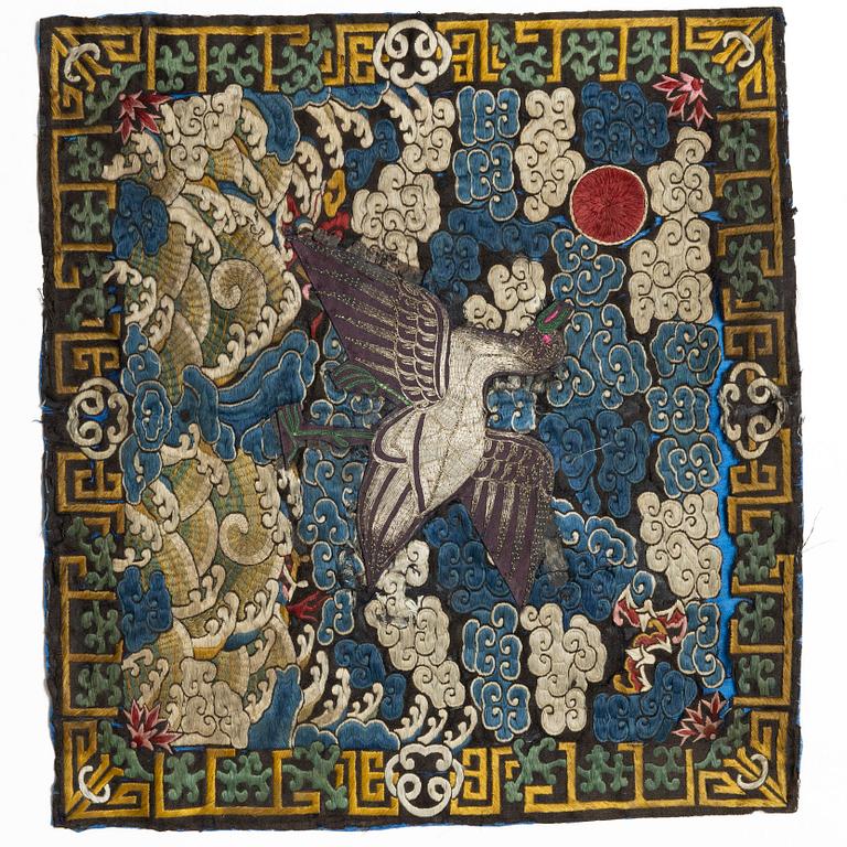 A pair of embroidered civil officials rank badges, Buzi, with egrets, Qing dynasty, 19th century.