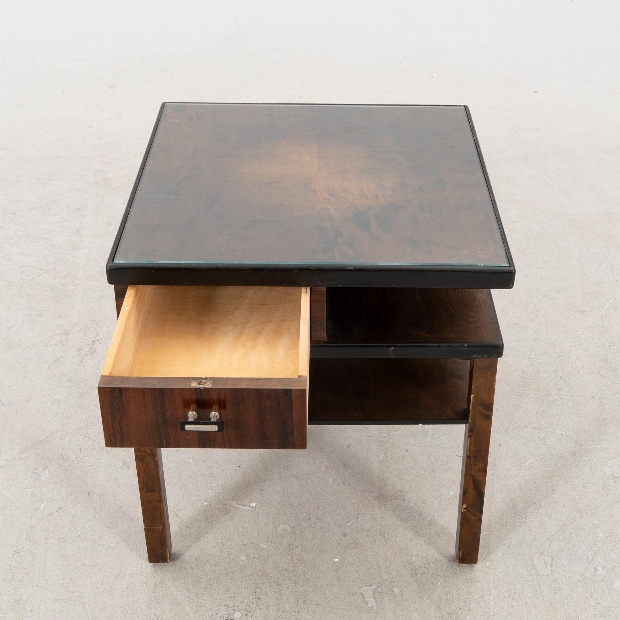 A 1940s birch side table.