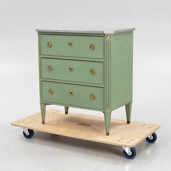 A Gustavian style chest of drawers, early 20th Century.