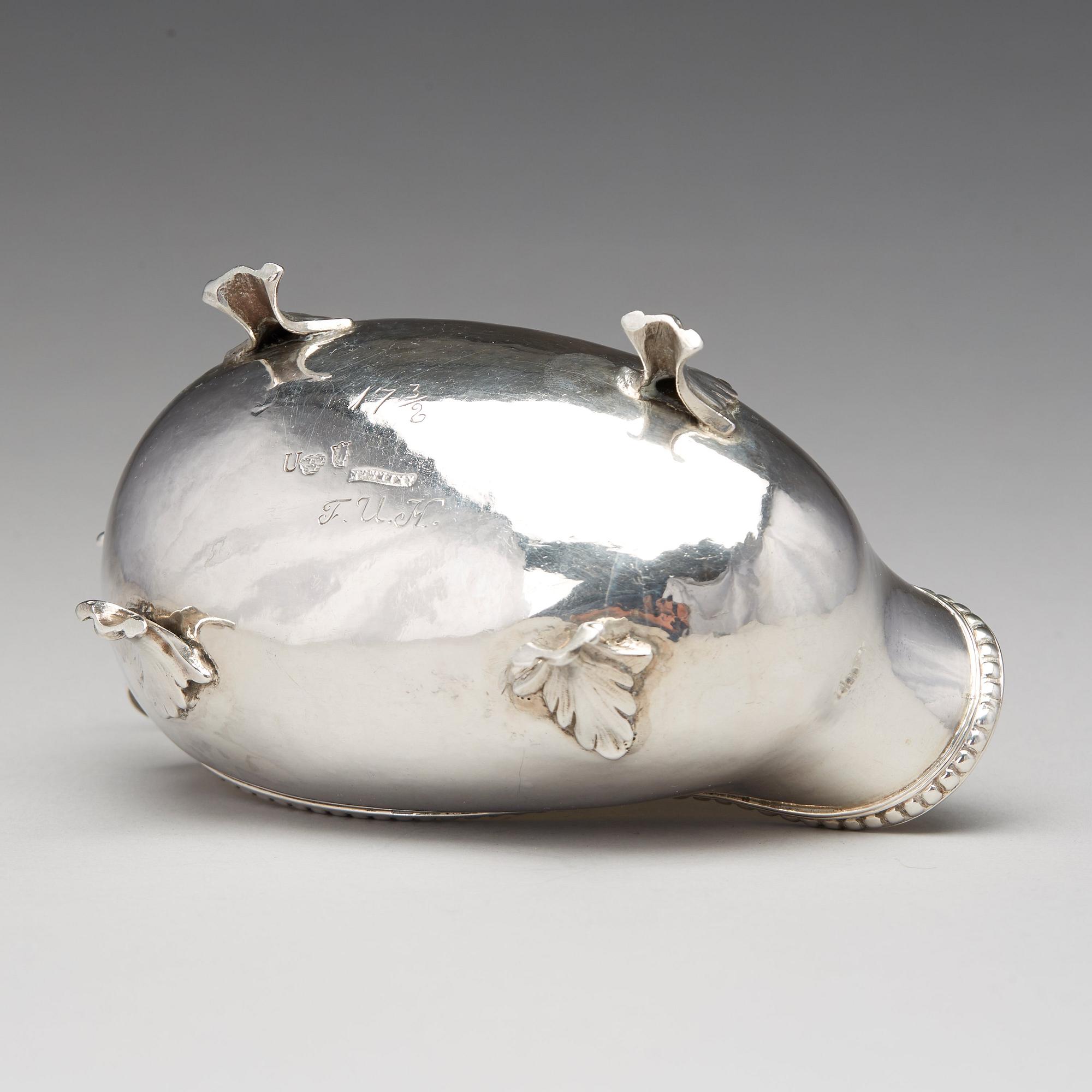 A Swedish Rococo parcel-gilt silver cream-jug, mark of Petter Åkerman, Stockholm 1778.
