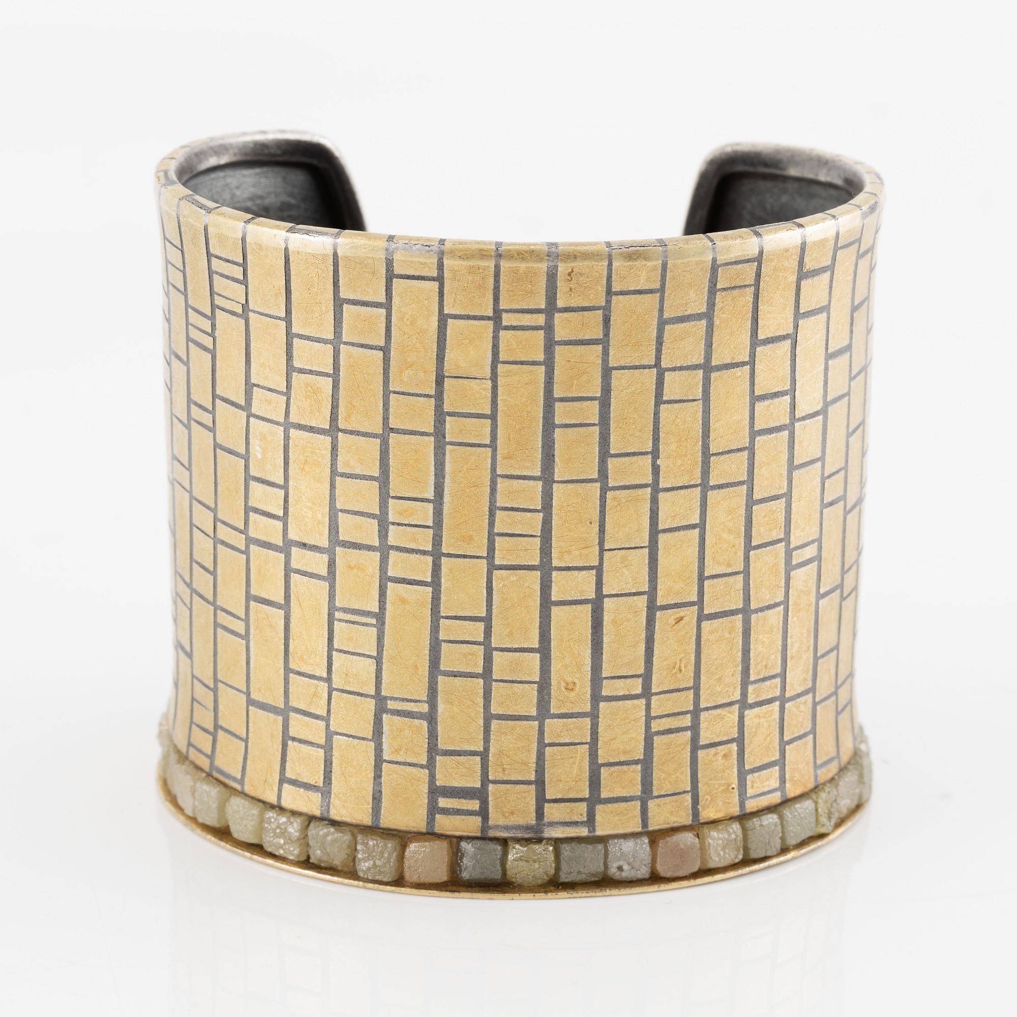 A cuff in silver and 18K gold with rough diamonds, Peter Schmid/Atelier Zobel.