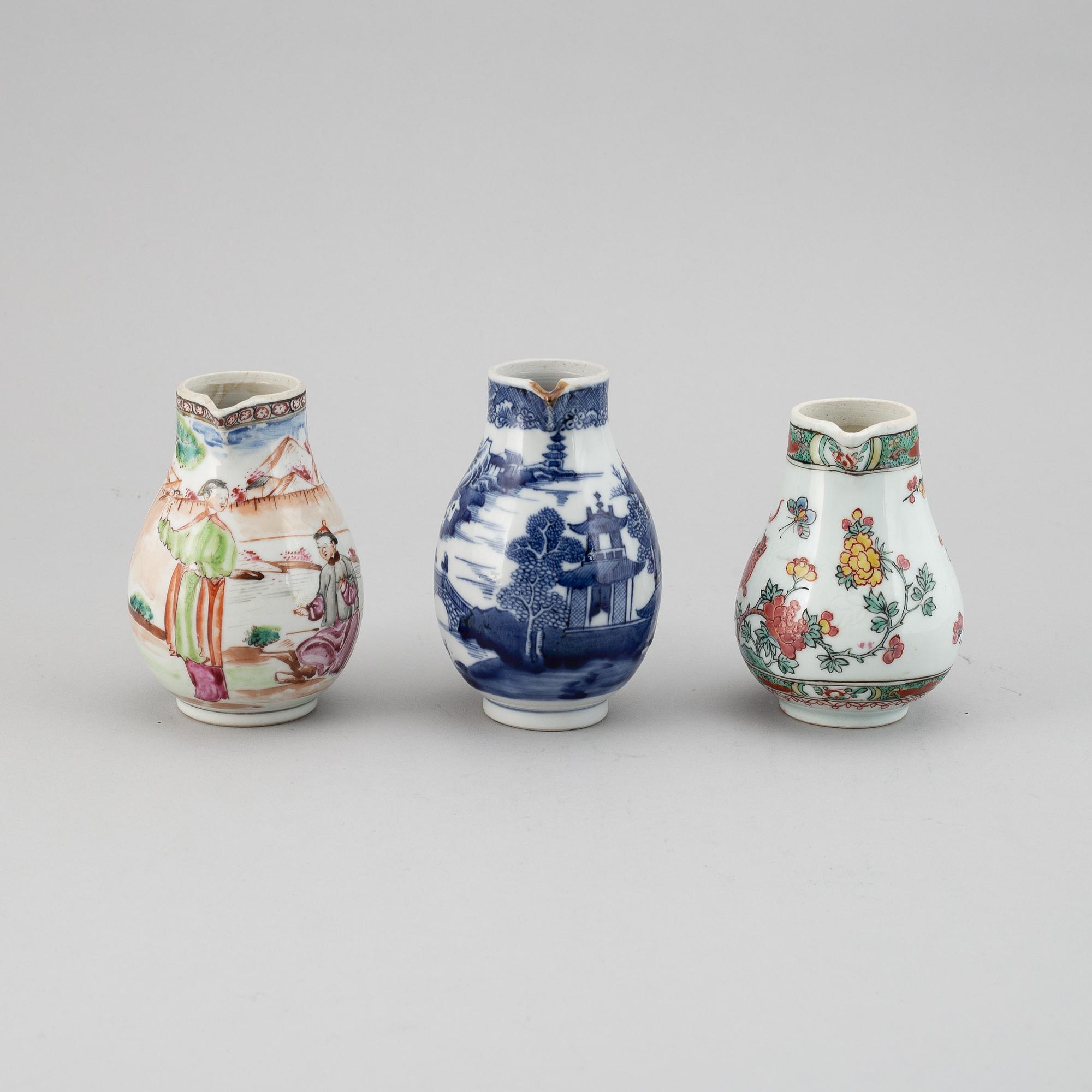 A group of three famille rose and blue and white jugs, Qing dynasty, Qianlong (1736-95).