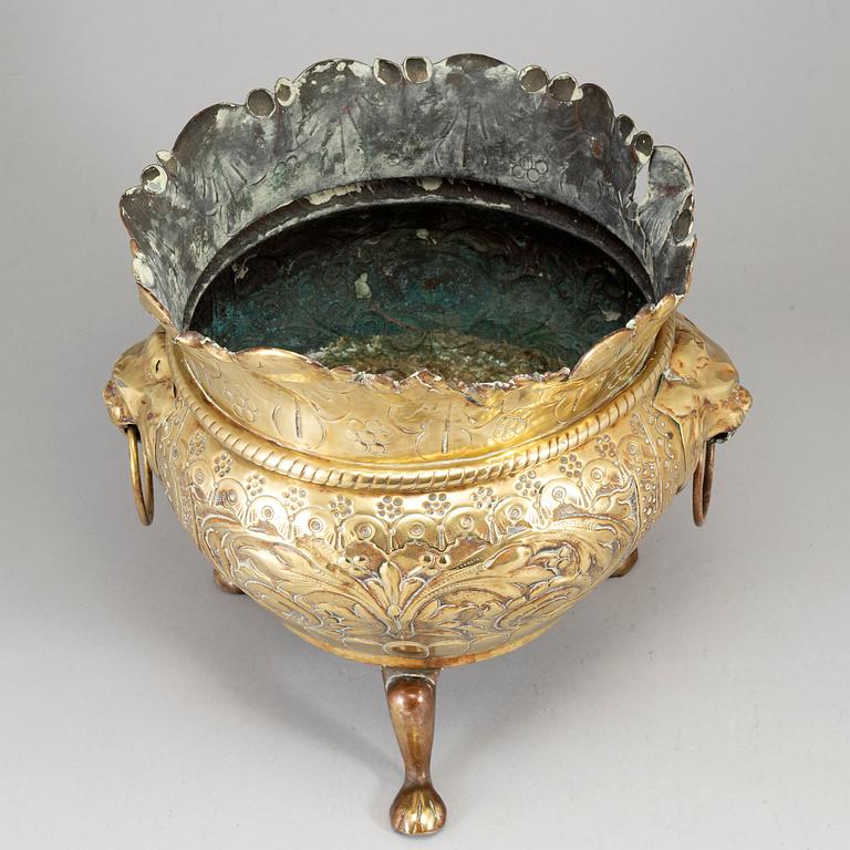 A large 19th century brass flower pot.