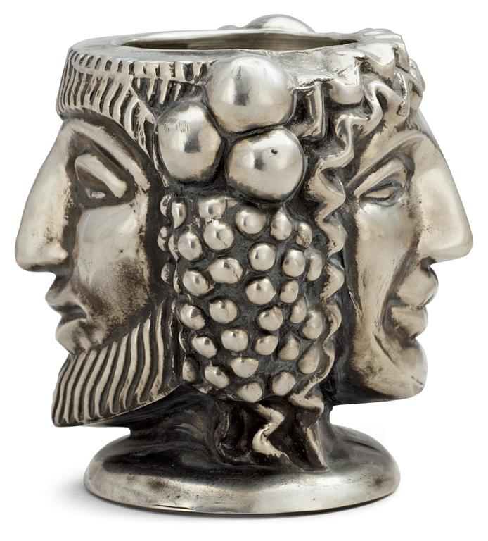An Anna Petrus "Janus head" pewter vase by Svenskt Tenn 1993.