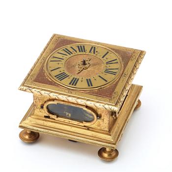 A Baroque 17th century gilt copper table clock.