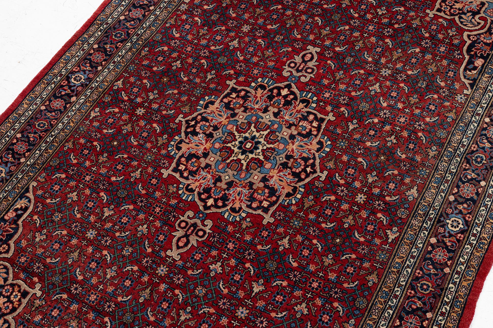An old Bidjar rug, c. 225 x 143 cm.