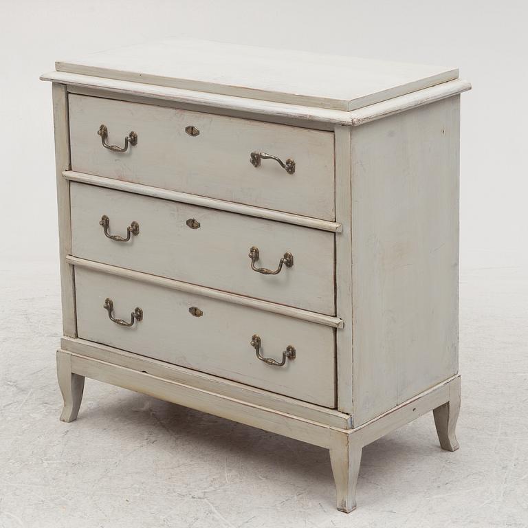 A chest of drawers, around 1900.