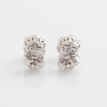 Earrings with brilliant-cut diamonds.